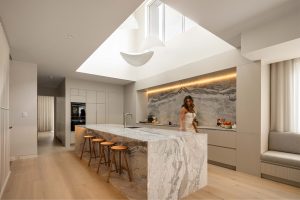 Luxury kitchen with natural stone benchtops and splashbacks