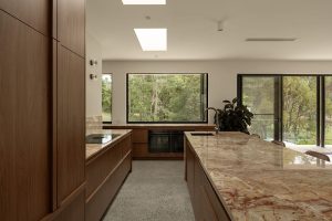 Luxury kitchen design with natural stone benchtops
